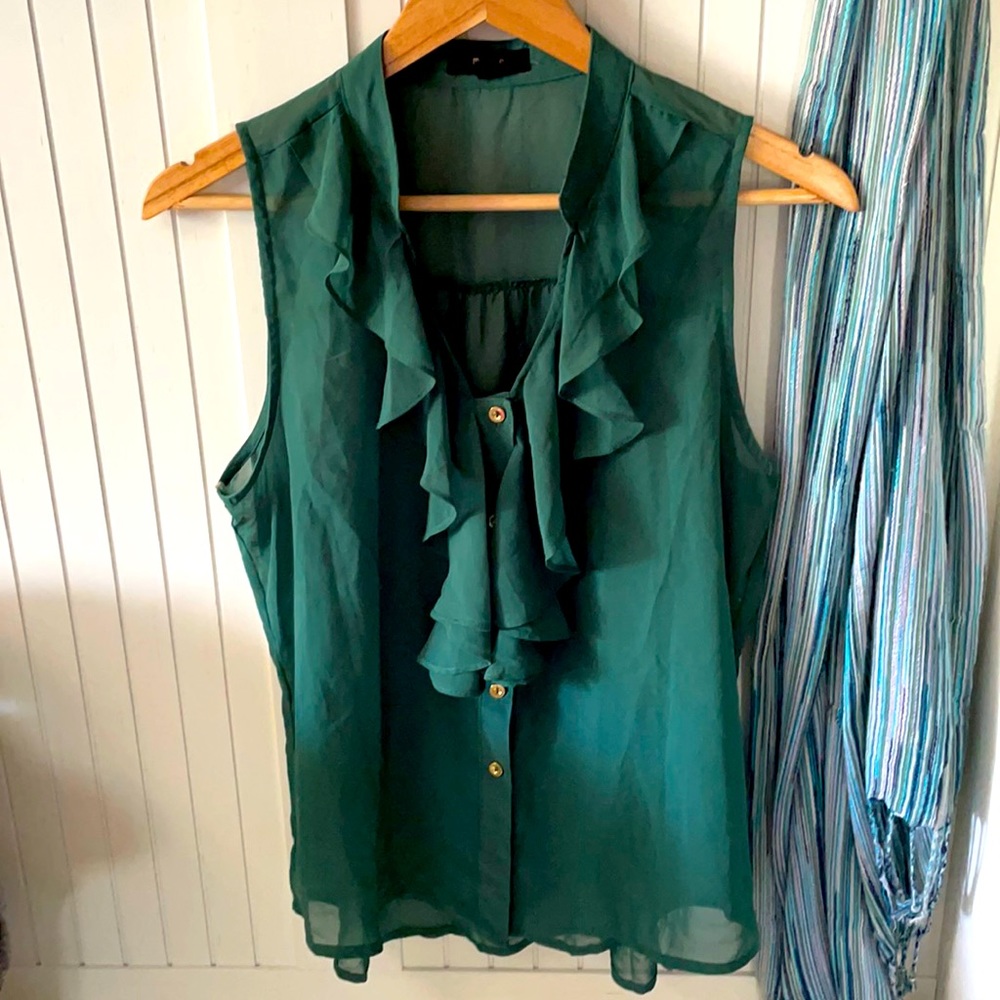 mine. Sleeveless button up blouse